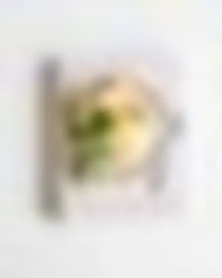 Copy-ready Imagen 4 prompt for a pastel soft cookbook cover (cover design). Soft pastel palette with rounded shapes and airy spacing, with lighting, materials, camera, angle and composition details for a 2:3 image.