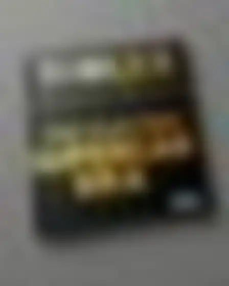 Copy-ready GPT Image prompt for a luxury foil automotive magazine cover (editorial design). Luxury black cover with embossed gold foil lettering, with lighting, materials, camera, angle and composition details for a 2:3 image.
