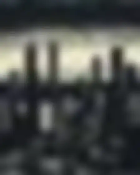 Copy-ready Imagen 4 prompt for a linocut city skyline (editorial illustration). Hand-carved linocut print with chunky black and one spot colour, rough ink coverage and carved gouge marks, with lighting, materials, camera, angle and composition details for a 4:5 image.