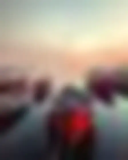 Digital Painting AI image prompt for a hazy colour field harbor boats: atmospheric colour-field painting of soft blurred bands of deep red, orange and rose with feathered glowing edges. Written for Imagen 4 on a 2:3 canvas, with lighting, materials, lens, angle and composition direction included.