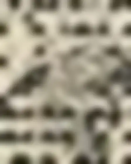 Copy-ready Stable Diffusion XL prompt for a quarter-circle tile pattern hillside village (editorial illustration). Monochrome black on off-white repeating tile pattern of interlocking quarter circles and half circles in a tight grid, with lighting, materials, camera, angle and composition details for a 4:3 image.