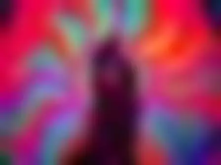 Fine Art AI image prompt for a op-art psychedelic embracing couple: psychedelic op-art of concentric rainbow rings, zebra stripes and optical wave patterns in vivid saturated colour. Written for Midjourney v7 on a 4:3 canvas, with lighting, materials, lens, angle and composition direction included.