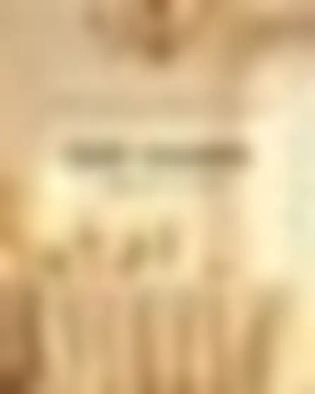 Instagram Post AI image prompt for a luxury gold and ivory baby shower: luxury ivory background with embossed gold-foil borders, elegant high-contrast serif lettering and a delicate gold monogram. Written for Flux 1.1 Pro on a 2:3 canvas, with lighting, materials, lens, angle and composition direction included.
